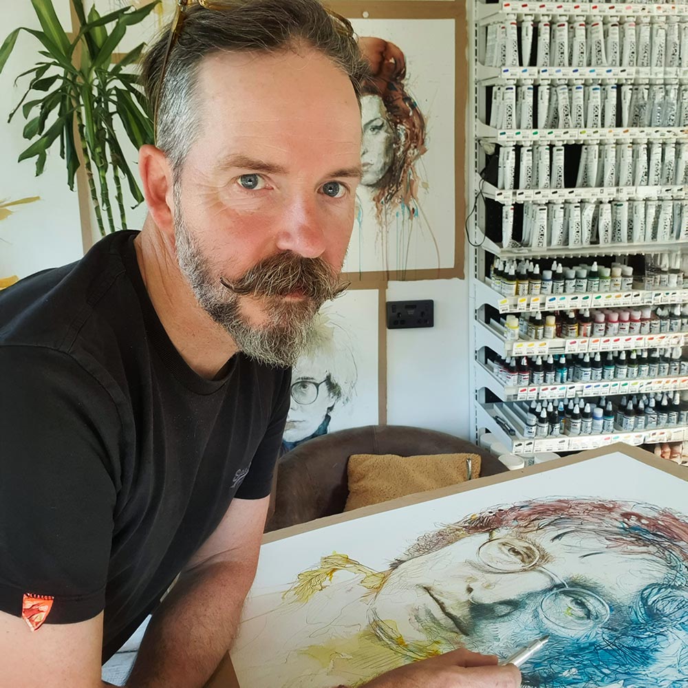 Portrait of artist Carne Griffiths in his studio 